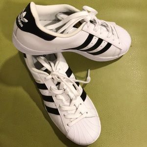 Brand new! Adidas Superstar Shoes. Size 7.5 US